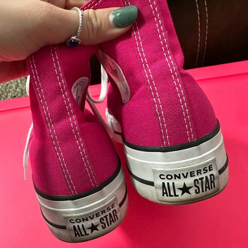 Pink high top platform converse